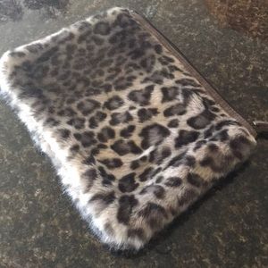 Deane and White furry make up/clutch/wristlet bag.